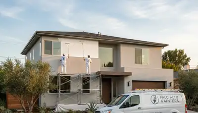 Professional house painters working on exterior home repaint in Mountain View, CA